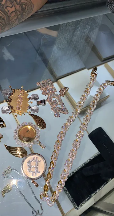 Jeff's Jewelry Co. Custom Diamond Jewelry - Grillz And Rolex - Cartier Glasses - Rings - Gold Necklaces - We Buy Gold 4